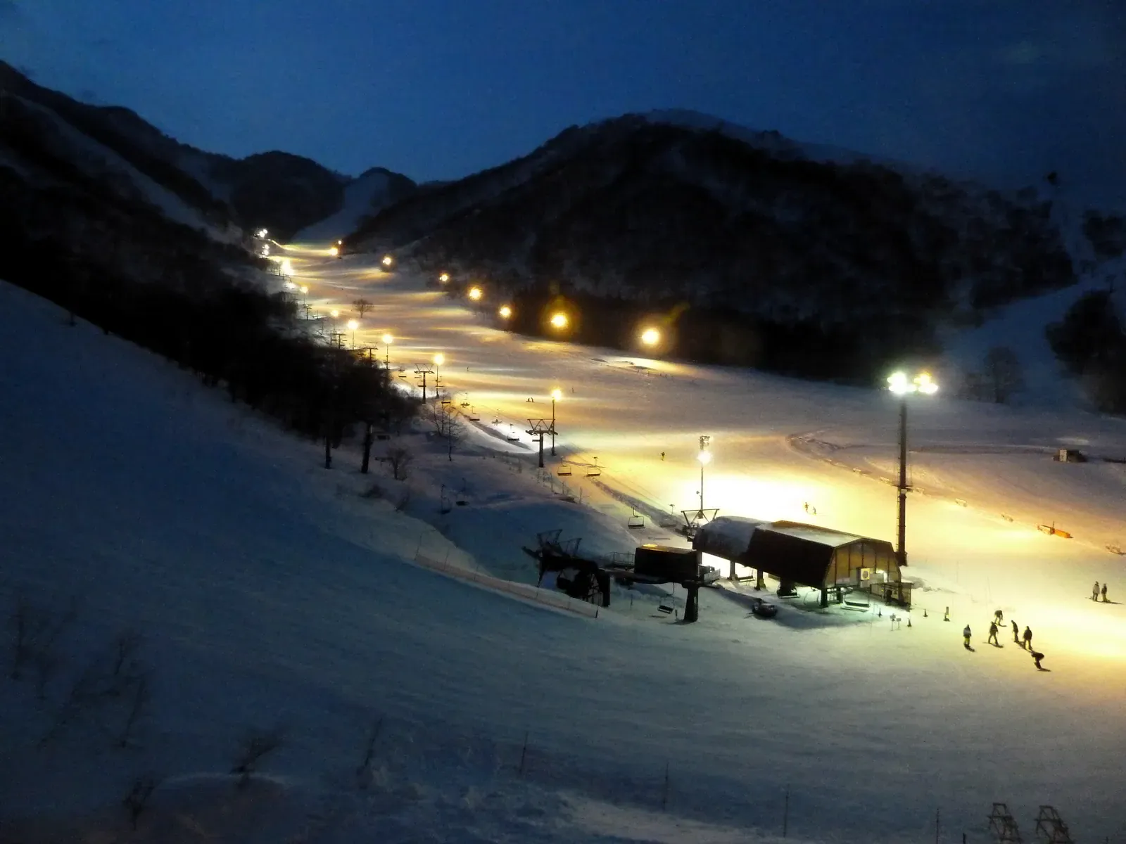 Night skiing slopes lit up at Hakuba Cortina