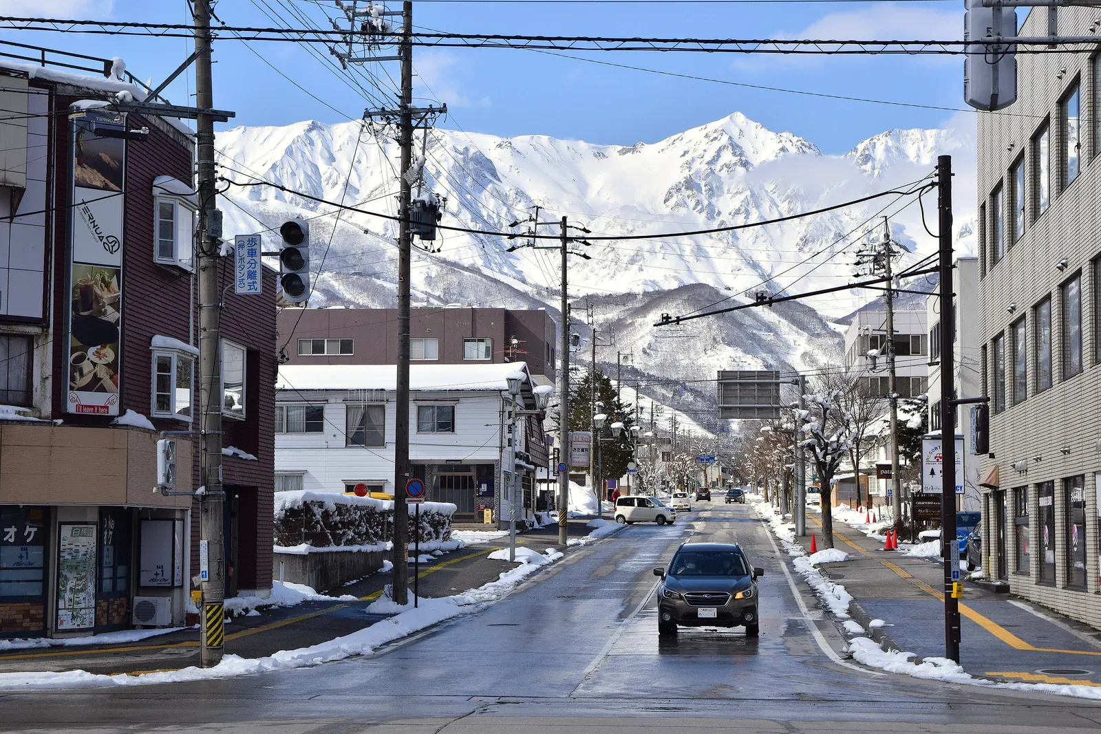 Hakuba street with snowy mountains behind