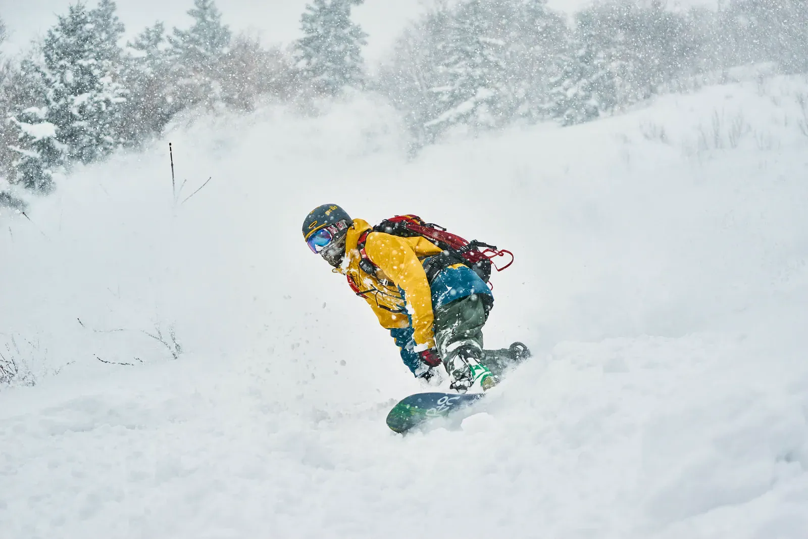 Snowboarder in deep powder