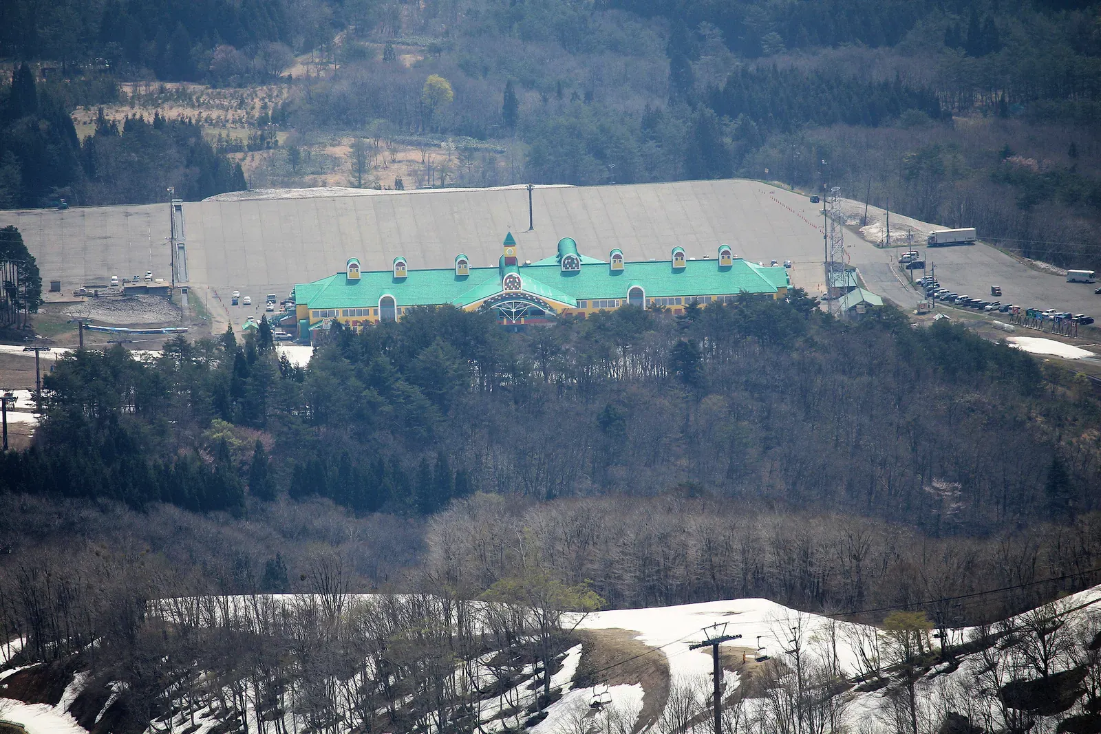 Ski resort buildings among snowy trees