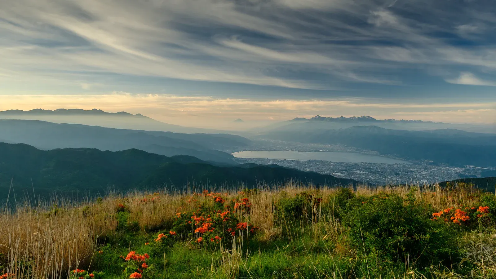 Mountain ridge and grassland with sea of cloud in Chubu, Japan