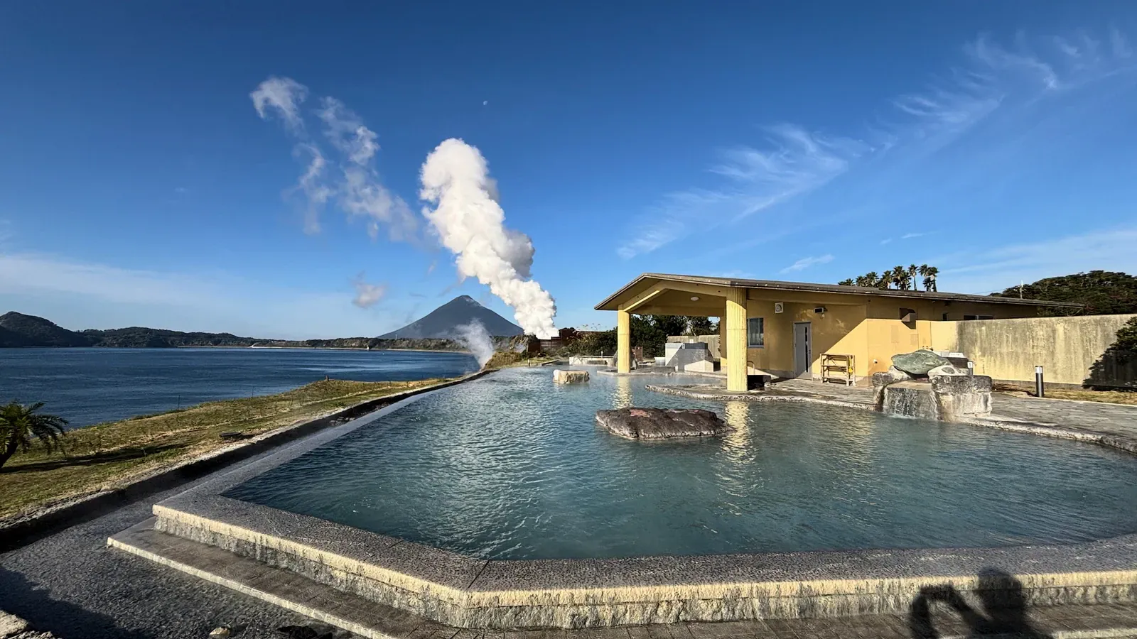 Sea-view outdoor bath at Tamatebako Onsen in Ibusuki