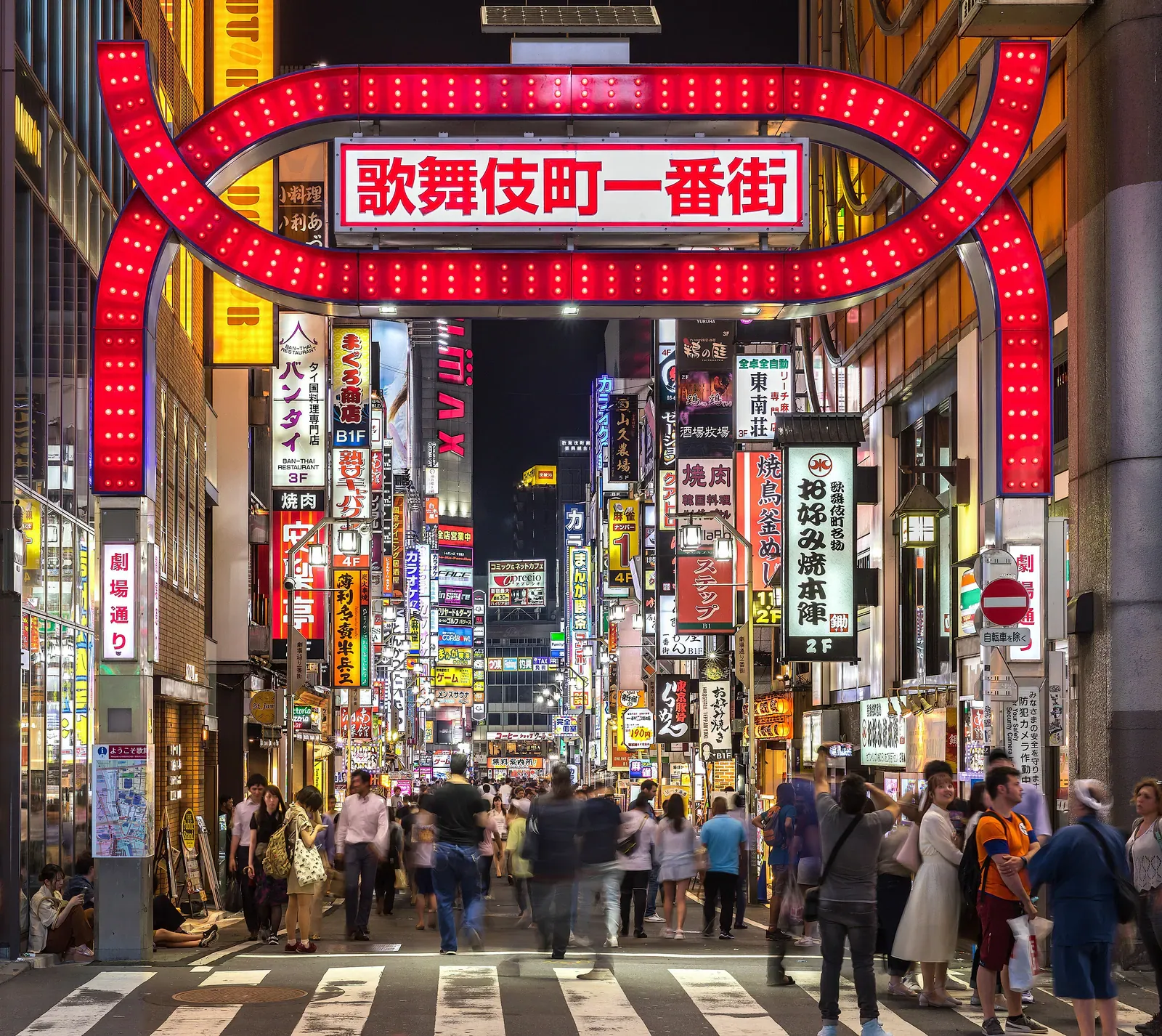 Kabukicho red gate and neon signs at night