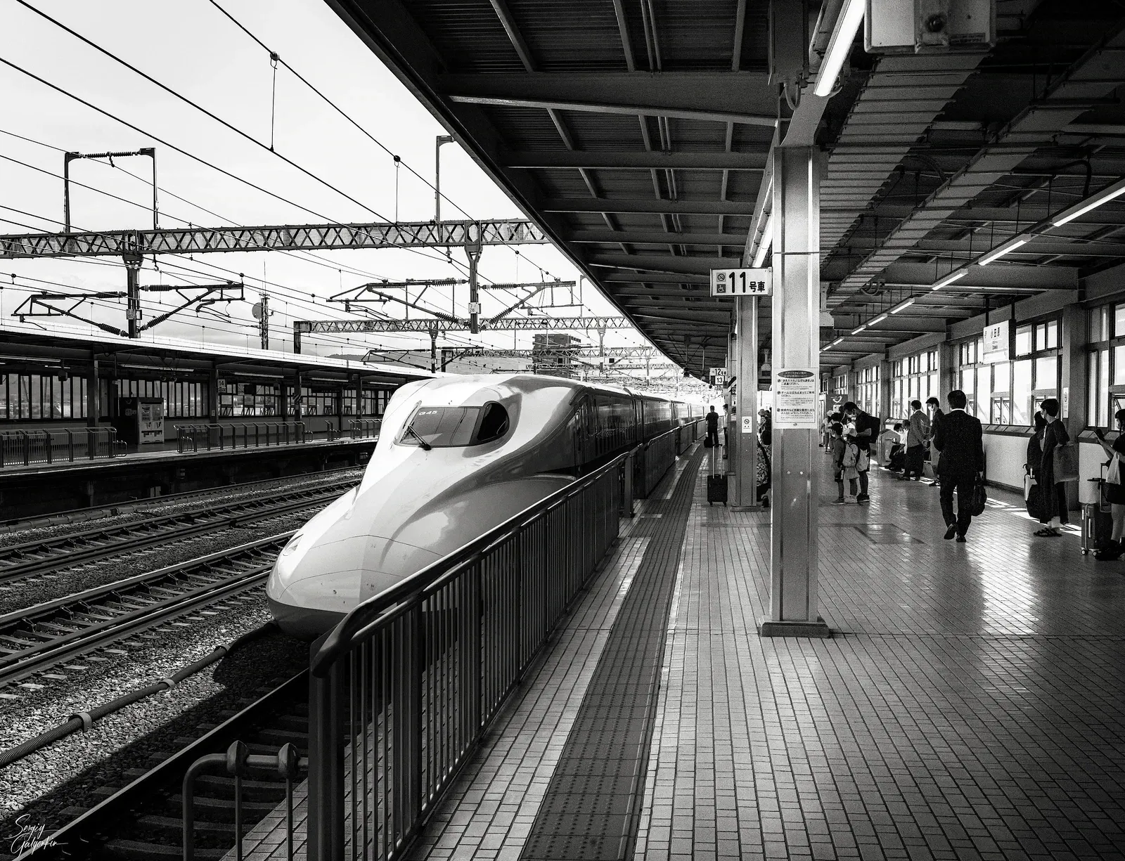 Shinkansen bullet train at a platform