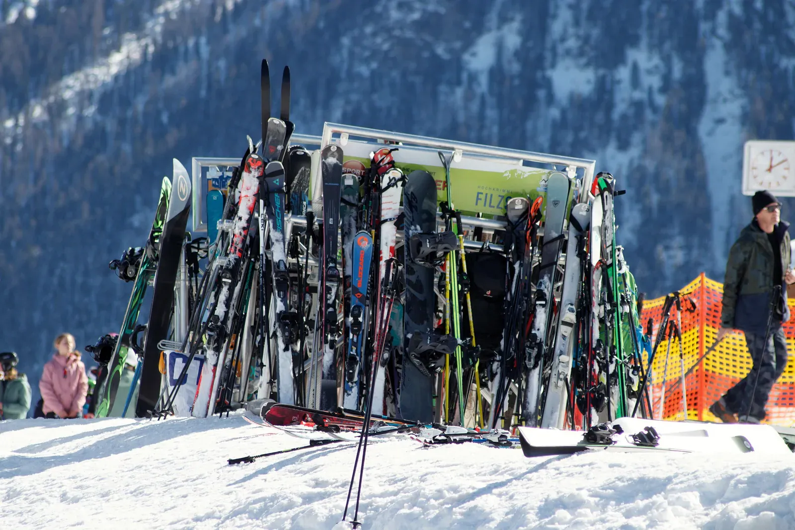 Skis and snowboards at a mountain resort
